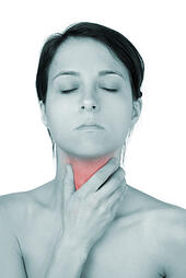 woman considers natural treatment for thyroid